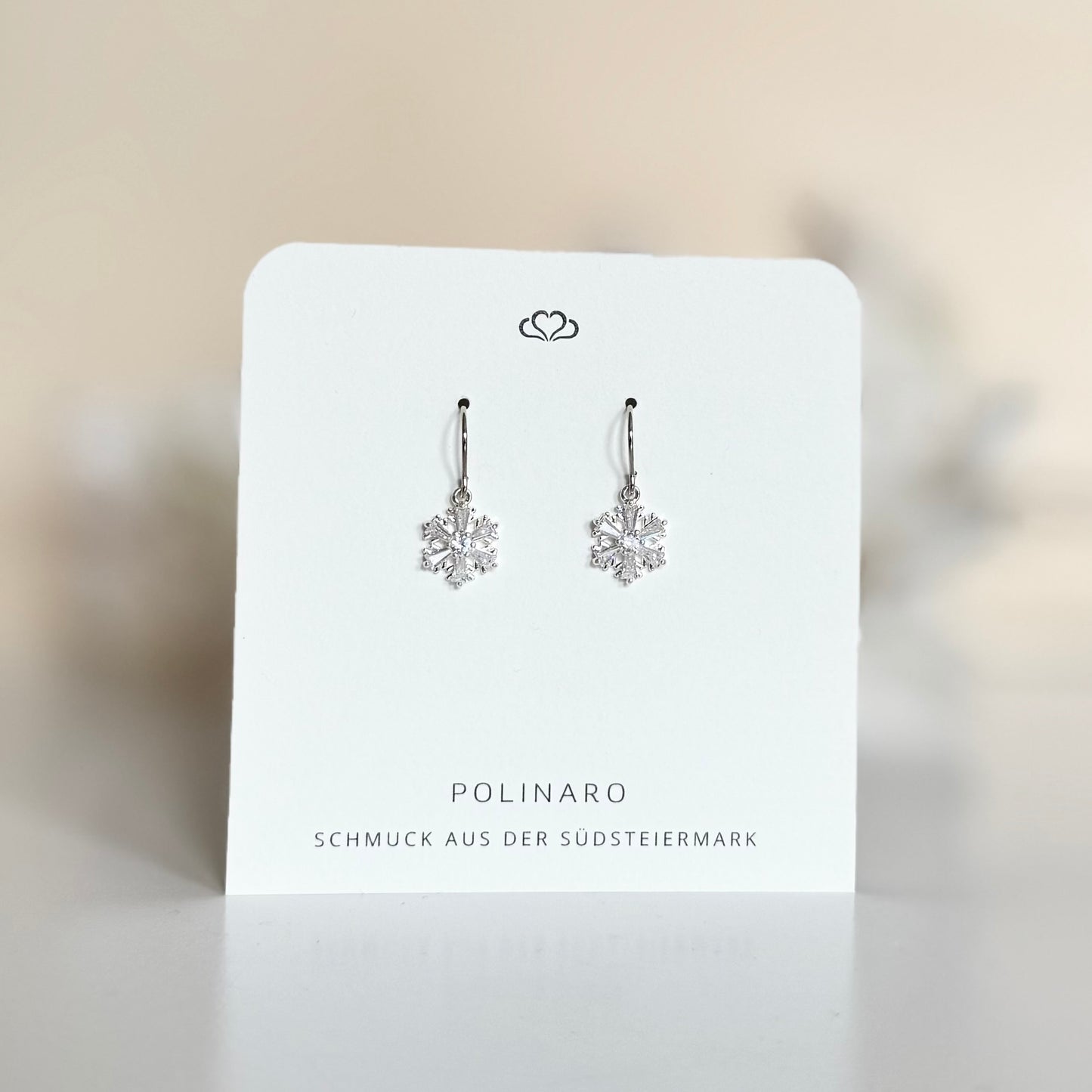 Ohrhänger Silberfarbene Schneeflocke